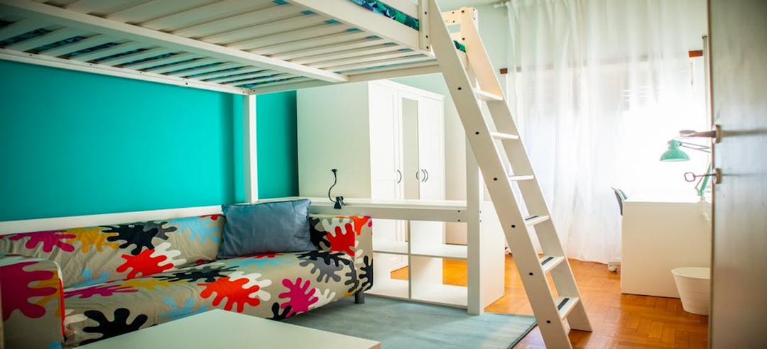 Ampia Camera Matrimoniale con Vista Giardino – Salario-Trieste